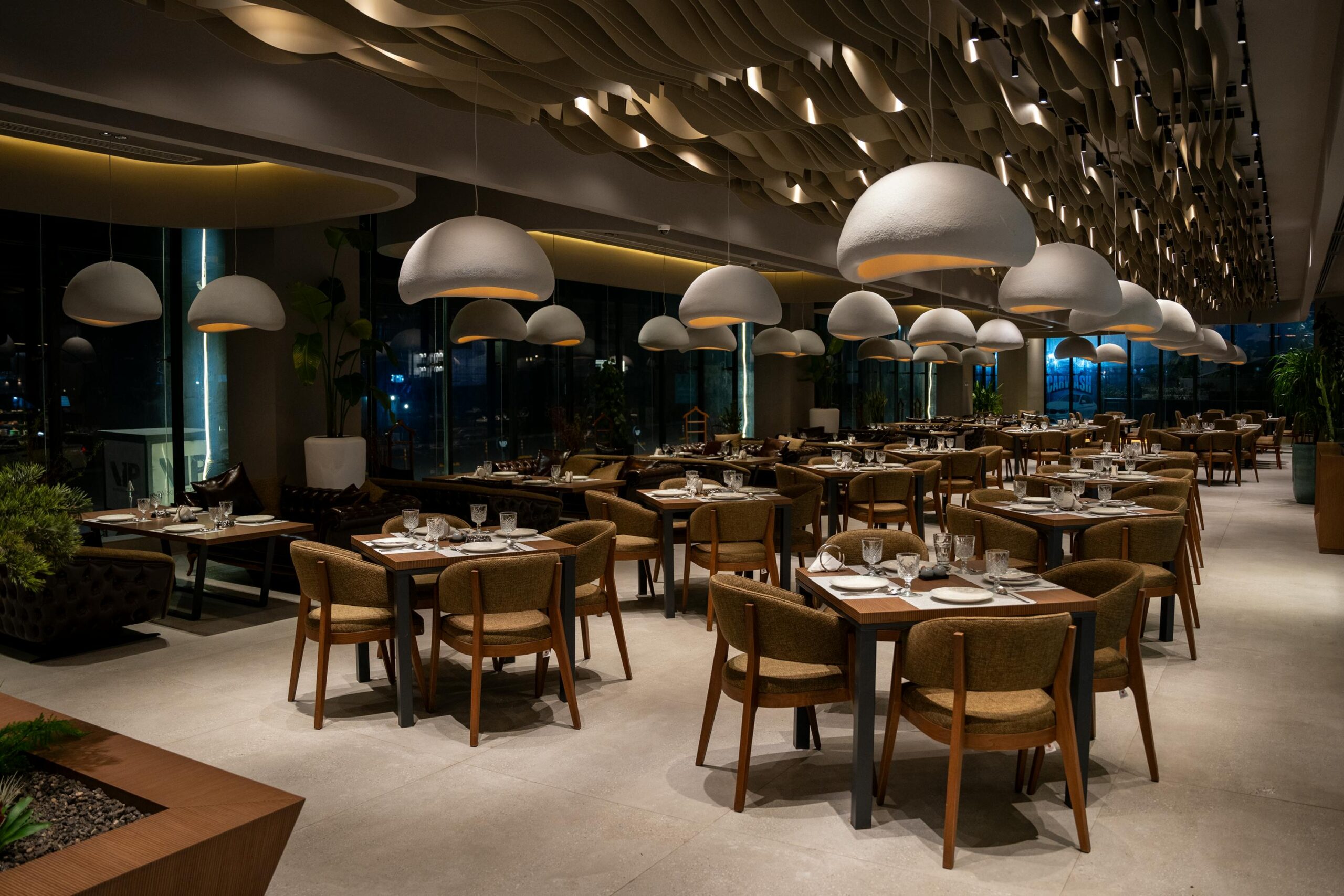 Modern restaurant interior in Sulaymaniyah with stylish lighting and elegant design.